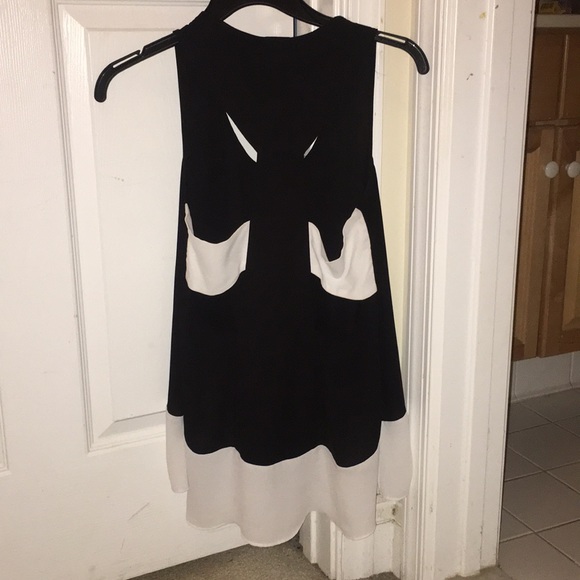 BCBG black and white sleeveless blouse w/ cutouts - Picture 2 of 3